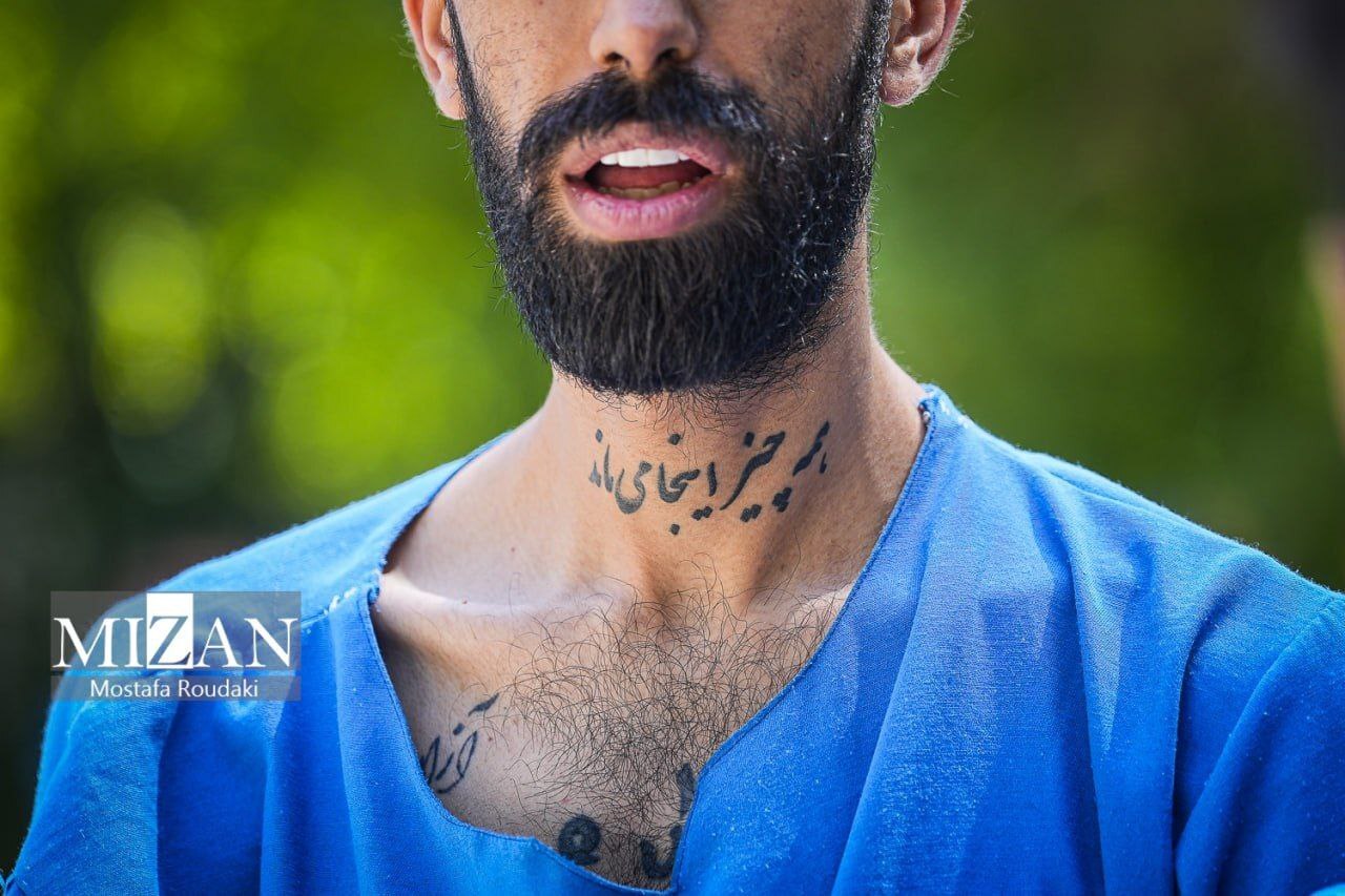 عکس| خالکوبی عجیب بر روی گردن یک شرور تهرانی!