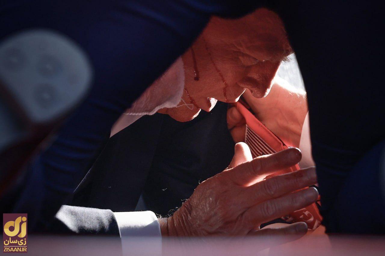 (تصاویر) ترامپ تنها گوشش زخمی نشده، تیر دوم به سینه دونالد ترامپ برخورد کرده است!