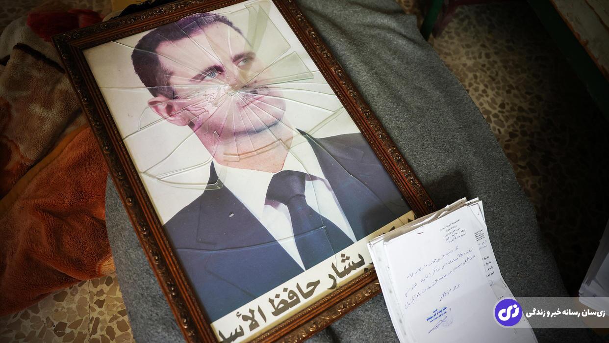قاب عکس شکسته شده بشار اسد بعد از سقوط دمشق