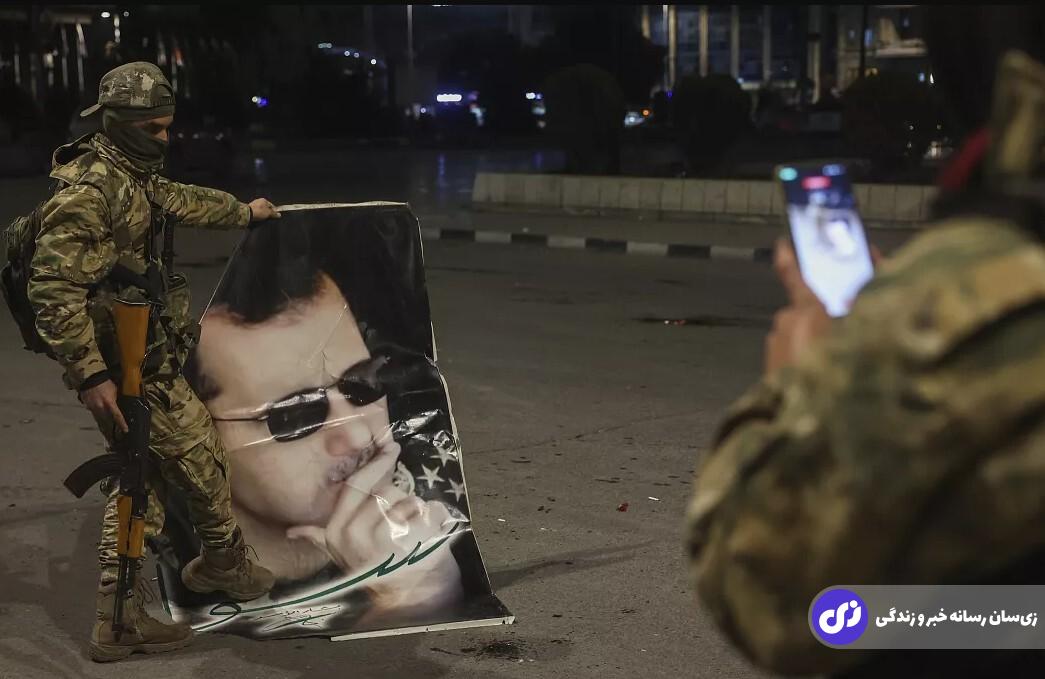 تصویر بشار اسد در دست یک سرباز بعد از سقوط دمشق