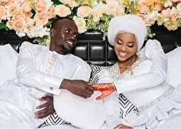 (عکس) عایشه تامبا، همسر سادیو مانه و نوزادش در جشن قهرمانی