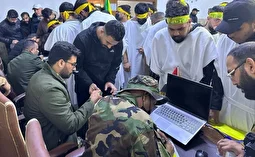 تصویر ثبت‌نام نیرو‌های مقاومت عراق برای دفاع از ایران