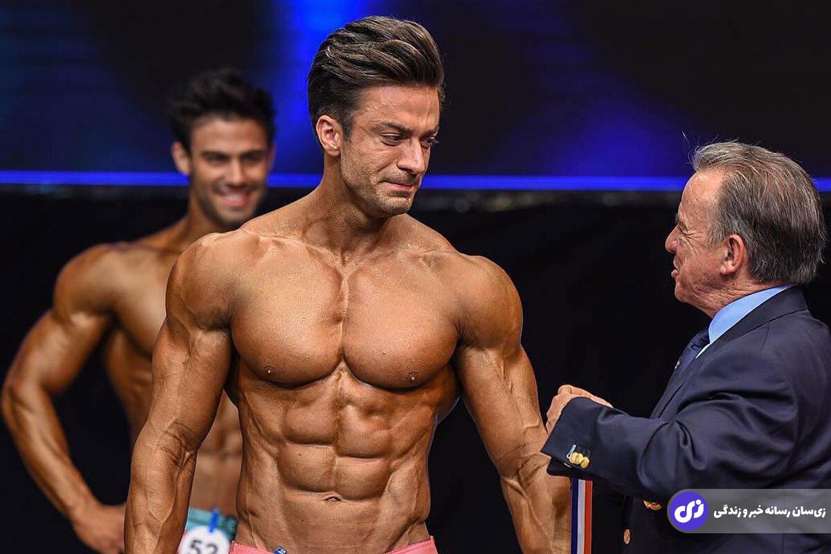 محمد کاشانکی؛ خوشتیپ ترین بدنساز ایران که به خاطر یک اتفاق تلخ از ژیمناستیک به بدنسازی آمد و قهرمان مسترالمپیای روسیه شد محمد کاشانکی؛ خوشتیپ ترین بدنساز ایران که به خاطر یک اتفاق تلخ از ژیمناستیک به بدنسازی آمد و قهرمان مسترالمپیای روسیه شد